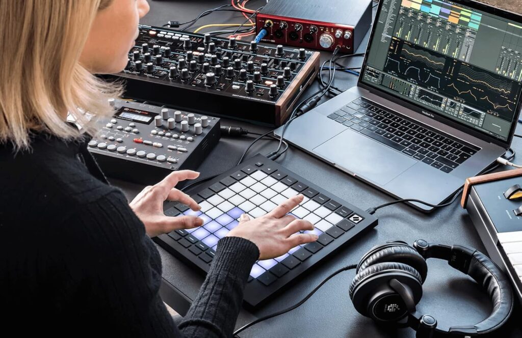 Person setting up Ableton Live with Launchpad